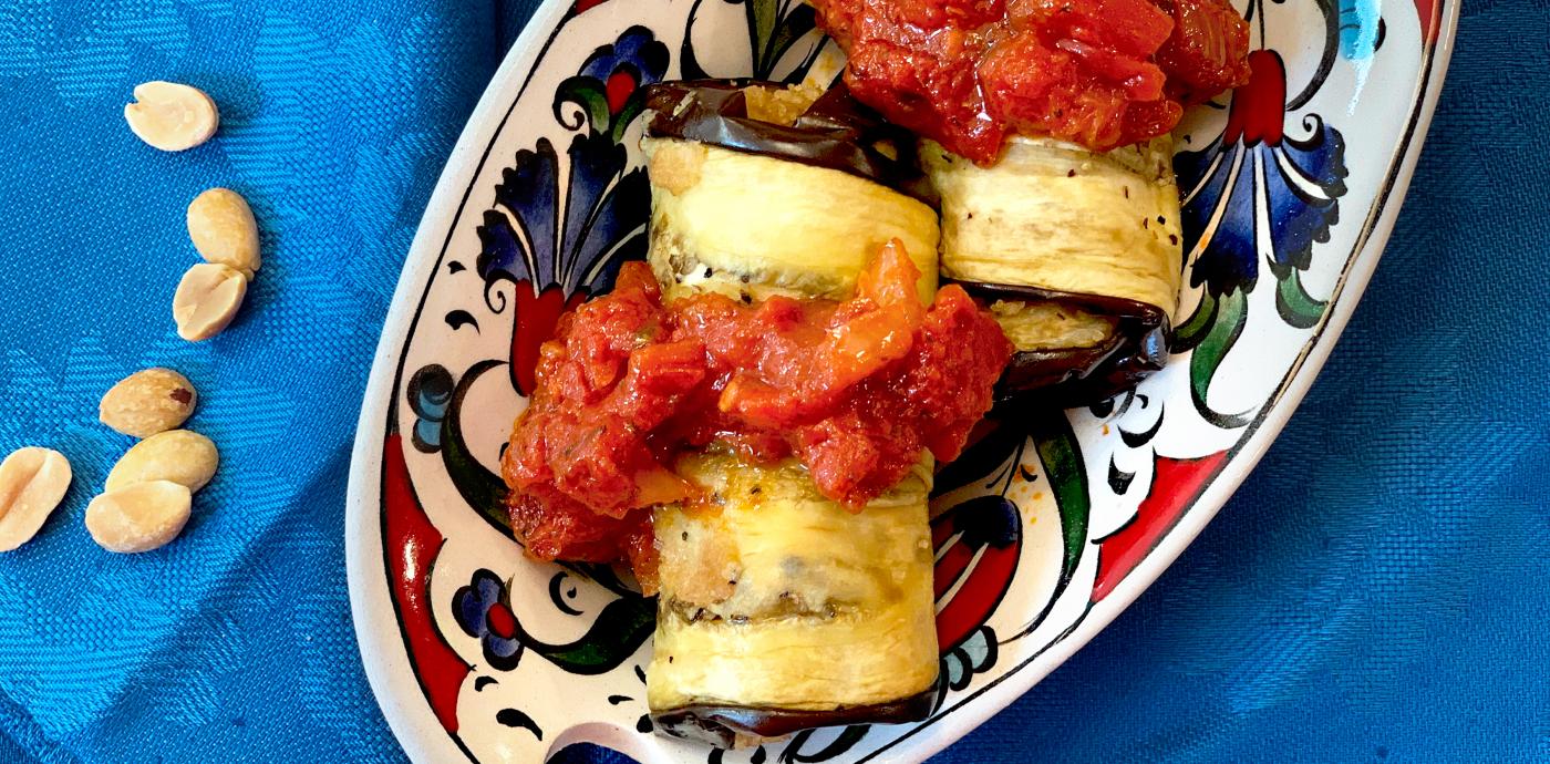 eggplant rollups topped with tomato sauce