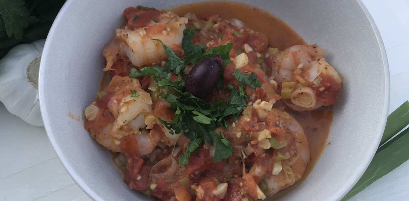 shrimp with tomato garlic sauce over barley