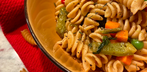 close up of rotini pasta and vegetables