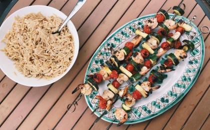 grilled shrimp and vegetable skewers served with whole grain orzo