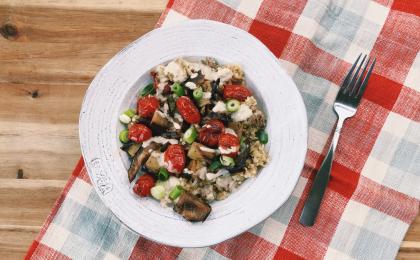 freekeh bowl with ground lamb, grilled tomatoes, and eggplant