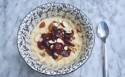 millet porridge topped with cherry compote and almonds