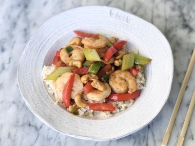 shrimp and vegetables in a white bowl