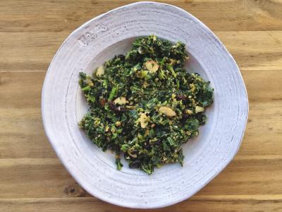 sauteed spinach and breadcrumbs served in a rustic white dish