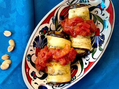 eggplant rollups topped with tomato sauce