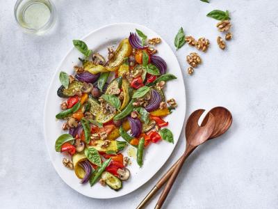 Colorful roasted vegetables with basil walnuts and balsamic vinaigrette