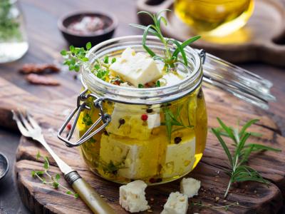 marinated feta cheese in olive oil with herbs and spices