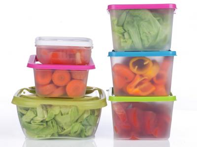 Colorful fruit and vegetables in plastic containers