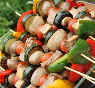 Tofu on skewers with mushrooms and peppers