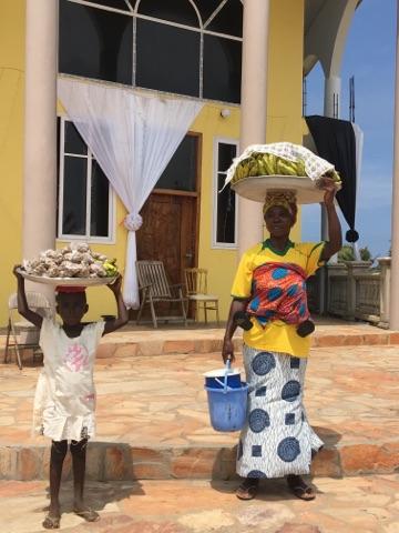 mother and daughter selling boiled groundnuts and bananas .jpg