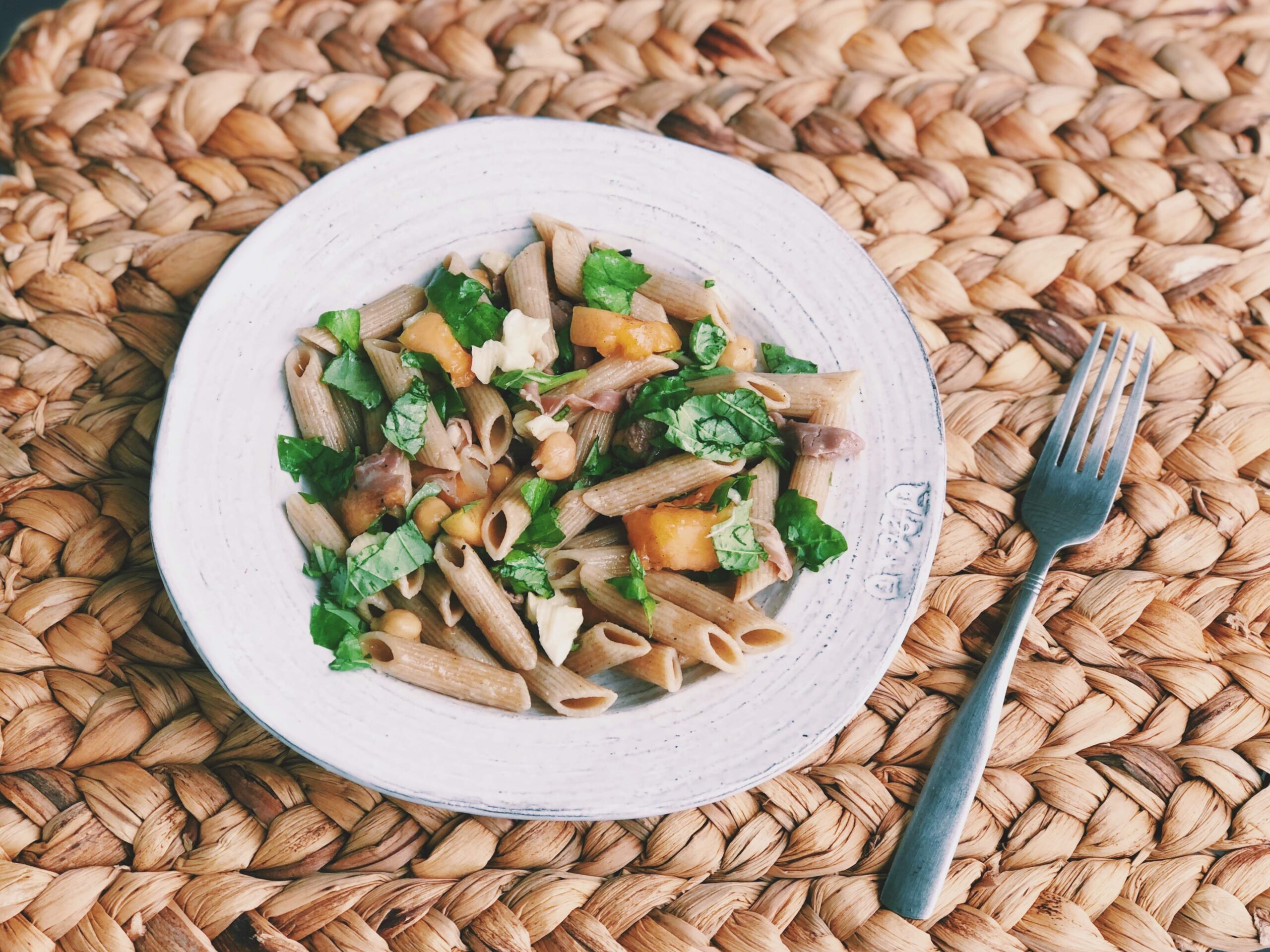 pasta salad with basil, grilled cantaloupe, and prosciutto