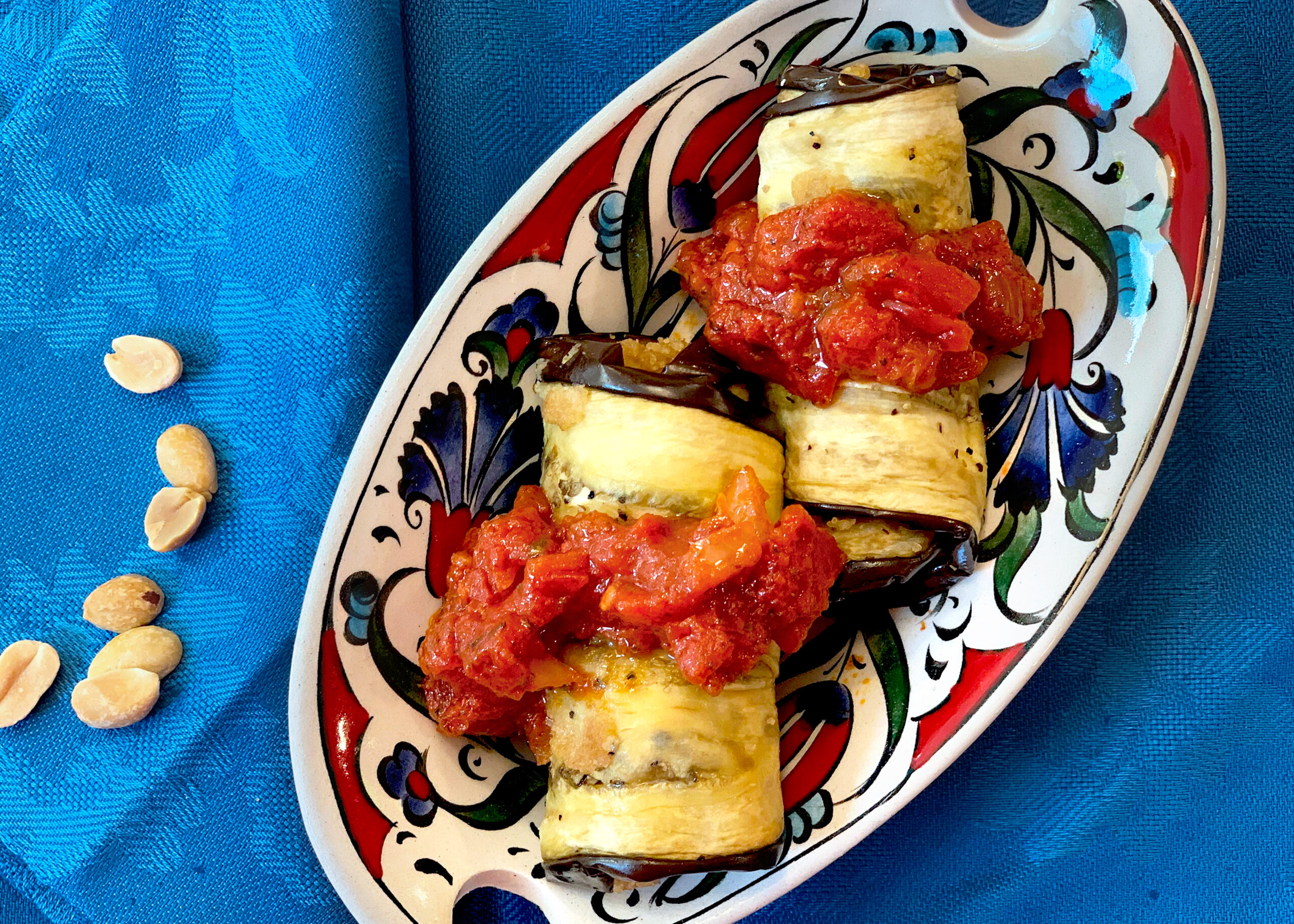 eggplant rollups topped with tomato sauce