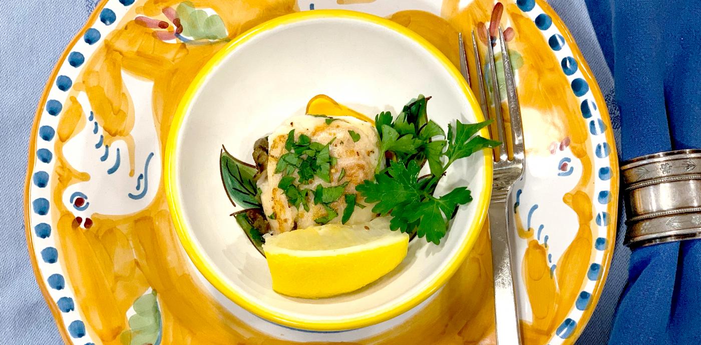 White Fish Garnished with Lemon, Extra Virgin Olive Oil, Herbs and Capers - OLDWAYS - Cultural Food Traditions OLDWAYS – Cultural Food Traditions