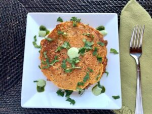 A plate of stacked pancakes