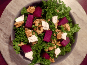 Kale with Roasted Beets, Wheat Berries, Goat Cheese, and Walnuts